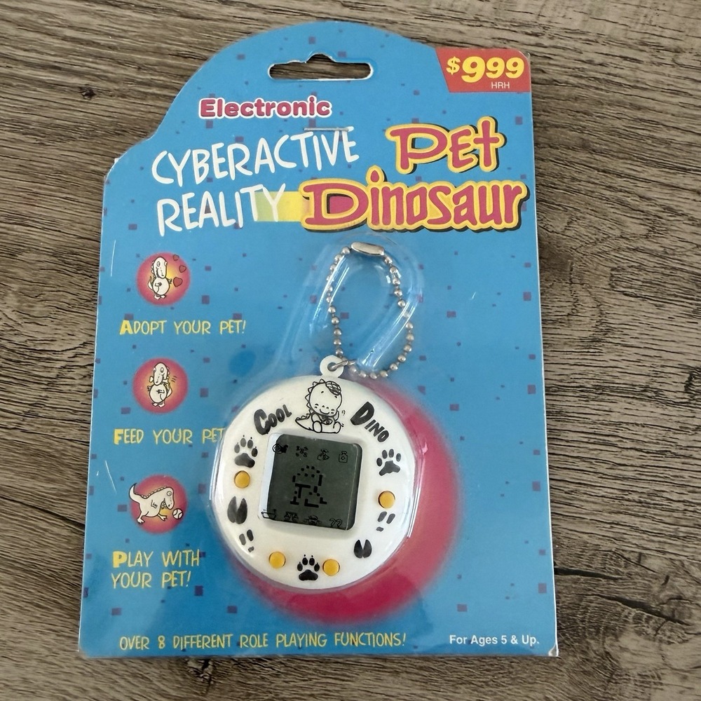 Virtual Cyber active Reality Pet Baby Dino Dinosaur Key Chain NEW Sealed Vintage